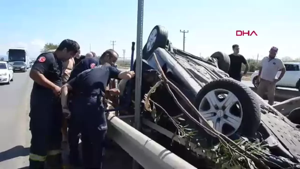Otomobil Takla Attı, Sürücü 3 Cep Telefonunu Bırakmadı