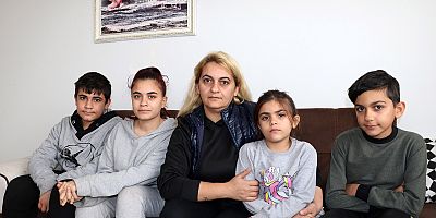 Depremzede aile, geçici yuvasında