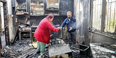 Küle dönen evden çocuklarını güçlükle çıkarttı