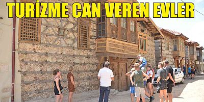 Turizme can veren evler